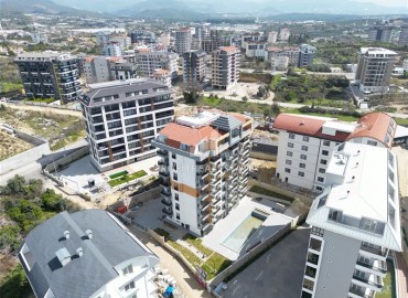 Меблированные апартаменты с одной спальней, 47м² в комфортабельной новостройке, в Авсалларе, Алания ID-18003 фото-13