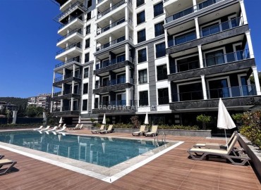 Двухкомнатные апартаменты, 60м², в резиденции премиум класса в центре Алании, 1000м от моря ID-18005 фото-1