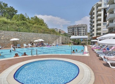 Элегантные апартаменты с двумя спальнями, 110м², в элитном комплексе в Авсалларе, Алания, в 600м от моря ID-18013 фото-14