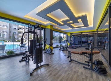 Элегантная квартира с одной спальней, 60м² в комплексе с отельной инфраструктурой в Махмутларе, Алания ID-18016 фото-17