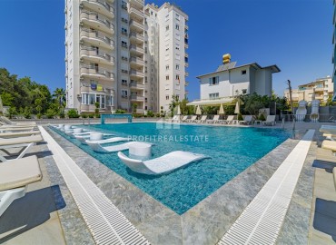 Элегантная квартира с одной спальней, 60м² в комплексе с отельной инфраструктурой в Махмутларе, Алания ID-18016 фото-18