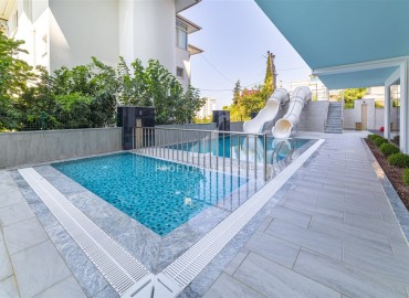 Элегантная квартира с одной спальней, 60м² в комплексе с отельной инфраструктурой в Махмутларе, Алания ID-18016 фото-19