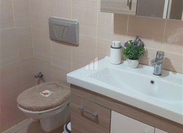 Меблированная квартира с двумя спальнями, 110м², у вторничного рынка в Махмутларе, Алания ID-18026 фото-12