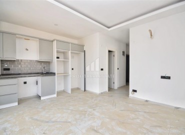 Квартира 1+1, 50м², с чистовой отделкой в новом комплексе премиум класса в центре Махмутлара, Алания ID-18027 фото-3