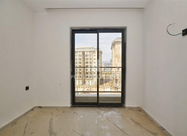 Квартира 1+1, 50м², с чистовой отделкой в новом комплексе премиум класса в центре Махмутлара, Алания ID-18027 фото-11