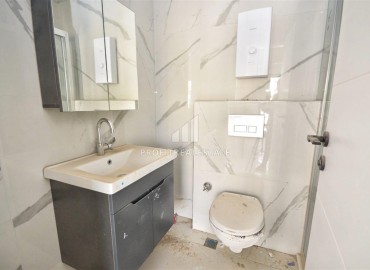 Квартира 1+1, 50м², с чистовой отделкой в новом комплексе премиум класса в центре Махмутлара, Алания ID-18027 фото-13