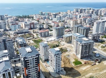 Квартира 1+1, 50м², с чистовой отделкой в новом комплексе премиум класса в центре Махмутлара, Алания ID-18027 фото-16