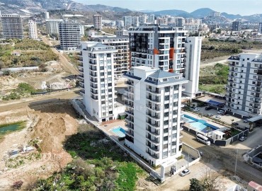 Квартира 1+1, 50м², с чистовой отделкой в новом комплексе премиум класса в центре Махмутлара, Алания ID-18027 фото-17