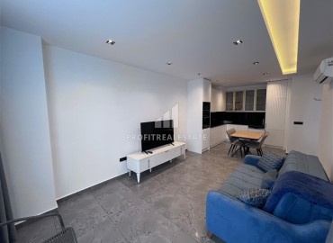 Меблированные апартаменты 1+1, 66,5м², с видом на море в элегантной резиденции на первой береговой линии в Каргыджаке, Алания ID-18033 фото-3