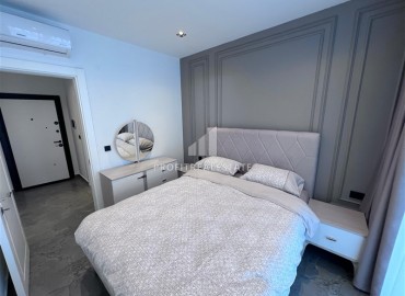 Меблированные апартаменты 1+1, 66,5м², с видом на море в элегантной резиденции на первой береговой линии в Каргыджаке, Алания ID-18033 фото-8