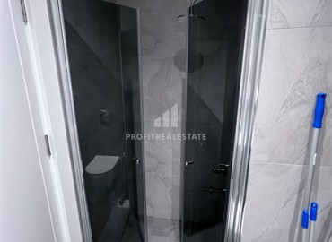 Меблированные апартаменты 1+1, 66,5м², с видом на море в элегантной резиденции на первой береговой линии в Каргыджаке, Алания ID-18033 фото-10