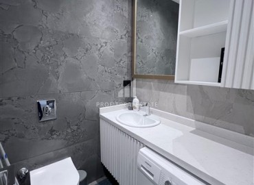 Меблированные апартаменты 1+1, 66,5м², с видом на море в элегантной резиденции на первой береговой линии в Каргыджаке, Алания ID-18033 фото-11