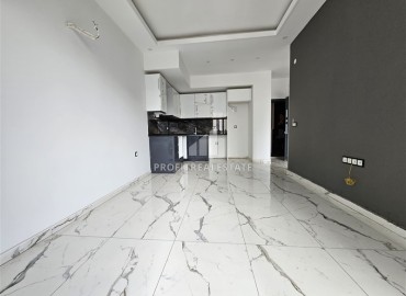 Апартаменты с одной спальней, 55м², в комфортабельной новостройке в 50м от моря, Кестель, Алания ID-18035 фото-2