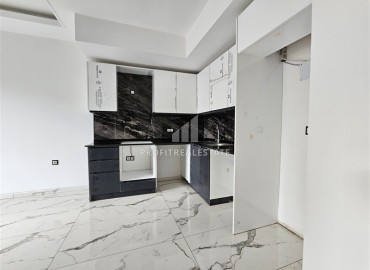 Апартаменты с одной спальней, 55м², в комфортабельной новостройке в 50м от моря, Кестель, Алания ID-18035 фото-3