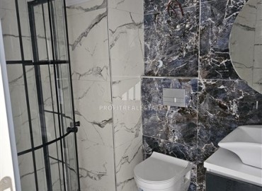 Апартаменты с одной спальней, 55м², в комфортабельной новостройке в 50м от моря, Кестель, Алания ID-18035 фото-10