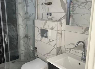 Двухкомнатная квартира, 50м², с видом на море, с чистовой отделкой в комфортабельной новостройке в районе Алании - Авсаллар ID-18036 фото-10