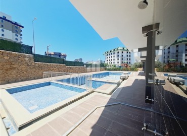 Двухкомнатная квартира, 50м², с видом на море, с чистовой отделкой в комфортабельной новостройке в районе Алании - Авсаллар ID-18036 фото-15