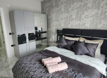 Дизайнерская квартира с одной спальней, 61м², в новом комплексе премиум класса у моря в Каргыджаке, Алания ID-18037 фото-3