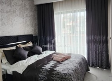 Дизайнерская квартира с одной спальней, 61м², в новом комплексе премиум класса у моря в Каргыджаке, Алания ID-18037 фото-6