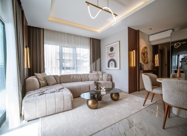 Фешенебельная трехкомнатная квартира, 95м², в элитной новостройке на первой береговой линии в Каргыджаке, Алания ID-18038 фото-2