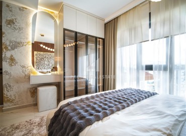 Фешенебельная трехкомнатная квартира, 95м², в элитной новостройке на первой береговой линии в Каргыджаке, Алания ID-18038 фото-4