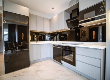 Фешенебельная трехкомнатная квартира, 95м², в элитной новостройке на первой береговой линии в Каргыджаке, Алания ID-18038 фото-5