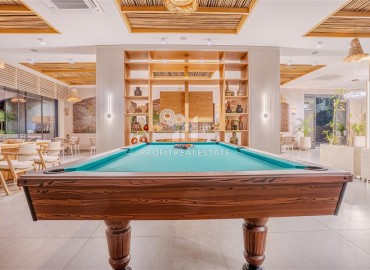 Фешенебельная трехкомнатная квартира, 95м², в элитной новостройке на первой береговой линии в Каргыджаке, Алания ID-18038 фото-15