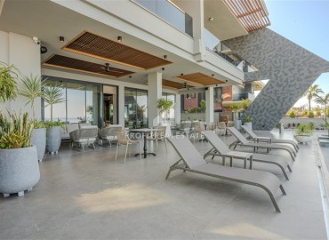 Фешенебельная трехкомнатная квартира, 95м², в элитной новостройке на первой береговой линии в Каргыджаке, Алания ID-18038 фото-16