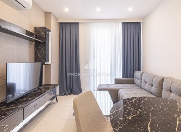Modern furnished 1+1 apartment, 500 meters from the Mediterranean Sea in a modern residence in the center of Alanya ID-16874 фото-2
