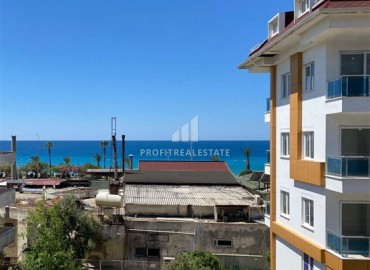 Видовы апартаменты с одной спальней, 55м², в комплексе с бассейном, в 50м от моря в Кестеле, Алания ID-18043 фото-2
