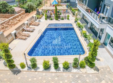 Great offer: 1+1 apartment, 44m², in a new residence with facilities in Oba, Alanya at an attractive price ID-16359 фото-9