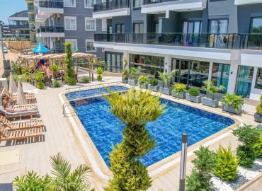 Great offer: 1+1 apartment, 44m², in a new residence with facilities in Oba, Alanya at an attractive price ID-16359 фото-10