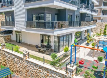 Great offer: 1+1 apartment, 44m², in a new residence with facilities in Oba, Alanya at an attractive price ID-16359 фото-11