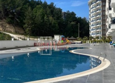 Укомплектованные двухкомнатные апартаменты, 50м², в комплексе премиум класса, у соснового леса в районе Авсаллар, Алания ID-17779 фото-25