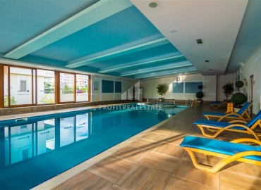 Готовая к проживанию, двухкомнатная квартира, 65м², с остекленным балконом в элитном комплексе у моря в Авсалларе, Алания ID-18053 фото-14