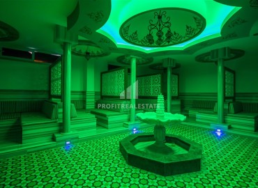 Готовая к проживанию, двухкомнатная квартира, 65м², с остекленным балконом в элитном комплексе у моря в Авсалларе, Алания ID-18053 фото-16