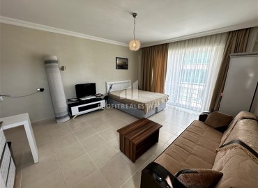 Уютная меблированная студия, 45м², в комфортабельной резиденции близко к морю в Махмутларе, Алания ID-18055 фото-2
