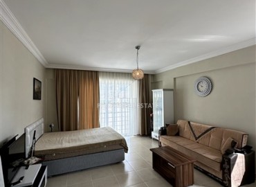 Уютная меблированная студия, 45м², в комфортабельной резиденции близко к морю в Махмутларе, Алания ID-18055 фото-3