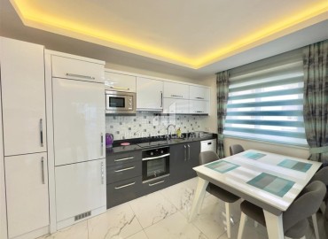 Меблированная квартира с двумя спальнями, 110м², в комплексе премиум класса в 300м от моря в Махмутларе, Алания ID-18057 фото-5