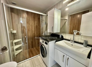Меблированная квартира с двумя спальнями, 110м², в комплексе премиум класса в 300м от моря в Махмутларе, Алания ID-18057 фото-7