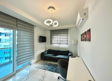 Меблированная квартира с двумя спальнями, 110м², в комплексе премиум класса в 300м от моря в Махмутларе, Алания ID-18057 фото-9