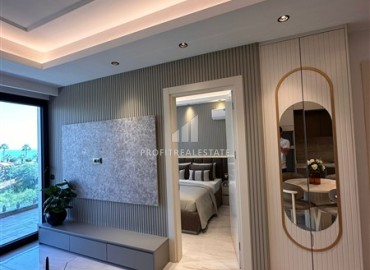 Элегантная двухкомнатная квартира, 55м², в фешенебельной резиденции на первой береговой линии в Махмутларе, Алания ID-18058 фото-6