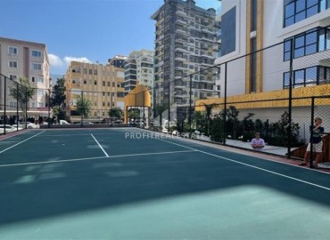 Элегантная двухкомнатная квартира, 55м², в фешенебельной резиденции на первой береговой линии в Махмутларе, Алания ID-18058 фото-14