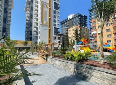 Элегантная двухкомнатная квартира, 55м², в фешенебельной резиденции на первой береговой линии в Махмутларе, Алания ID-18058 фото-17