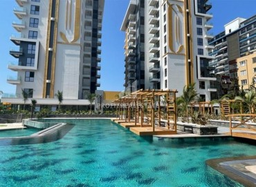 Элегантная двухкомнатная квартира, 55м², в фешенебельной резиденции на первой береговой линии в Махмутларе, Алания ID-18058 фото-19