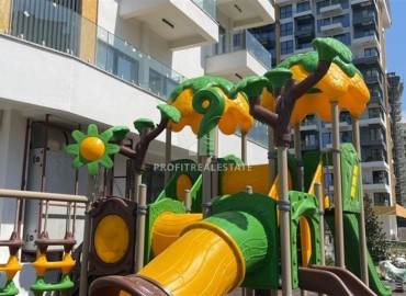Элегантная двухкомнатная квартира, 55м², в фешенебельной резиденции на первой береговой линии в Махмутларе, Алания ID-18058 фото-20