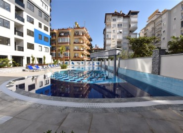 Меблированная трехкомнатная квартира, 75м², в комплексе премиум класса у пляжа Клеопатры, Алания ID-17434 фото-12