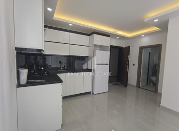 Новые апартаменты 1+1, 57м², с мебелью, в комплексе с инфраструктурой в Авсалларе в 2000м от моря ID-18059 фото-4