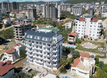 Новые апартаменты 1+1, 57м², с мебелью, в комплексе с инфраструктурой в Авсалларе в 2000м от моря ID-18059 фото-10