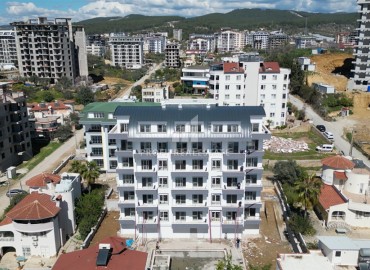 Новые апартаменты 1+1, 57м², с мебелью, в комплексе с инфраструктурой в Авсалларе в 2000м от моря ID-18059 фото-13